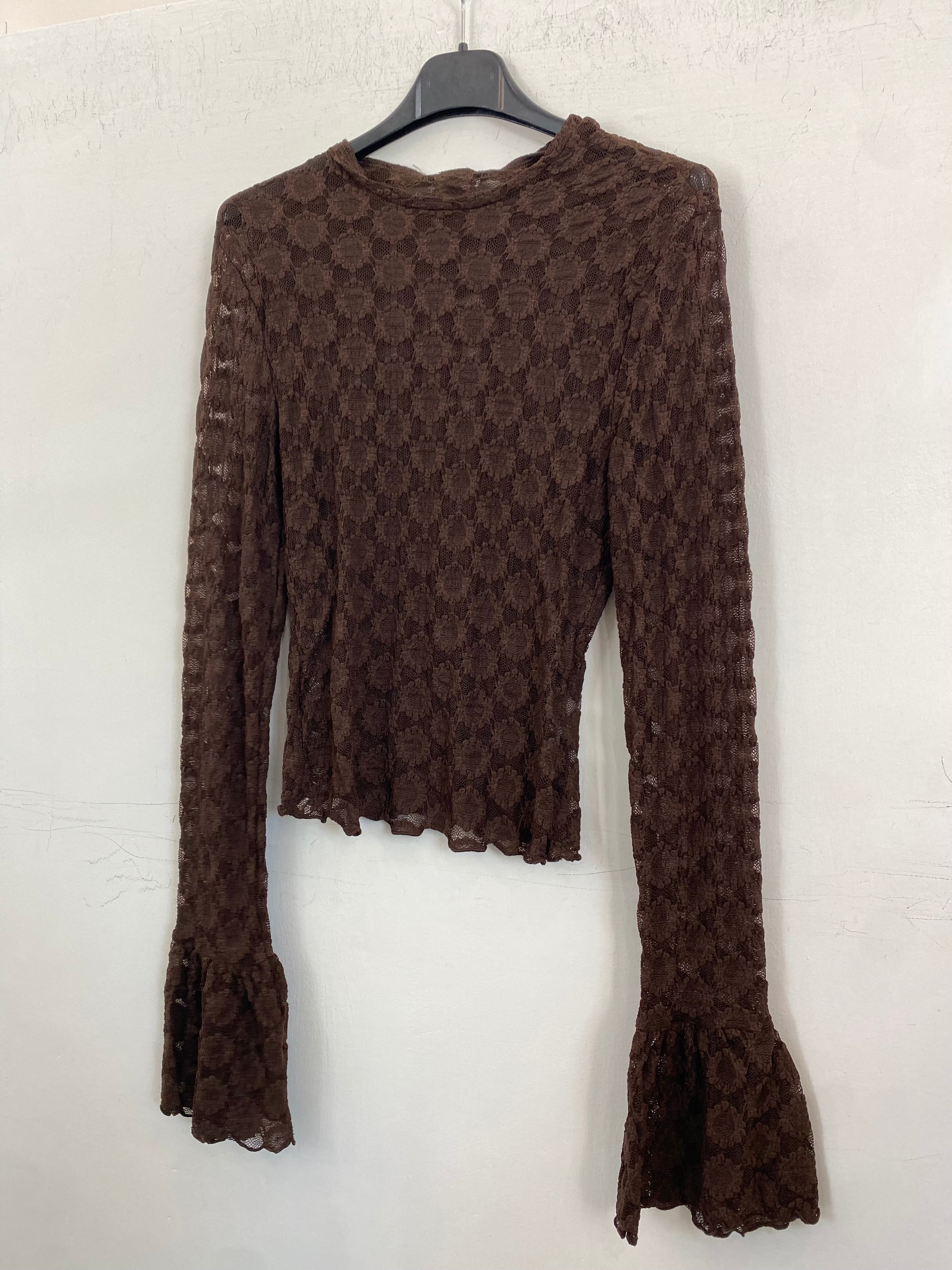 Maglia velata con fantasia ricamata 23448