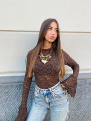 Maglia velata con fantasia ricamata 23448